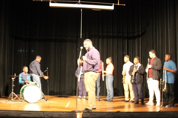 Mr. P. and musical group performing, "I feel good", sang by James Brown.